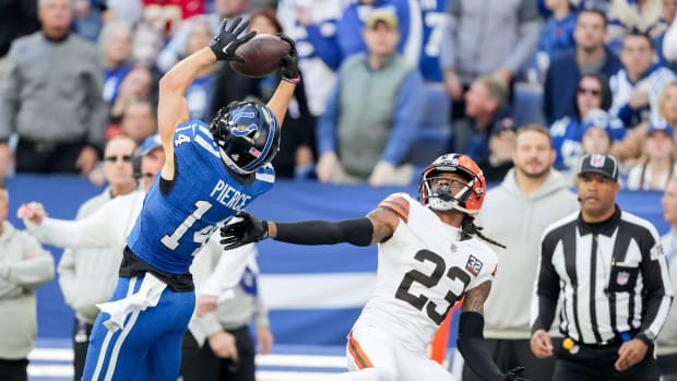 Indianapolis Colts wide receiver Alec Pierce (14) goes up to make a catch in front of Cleveland Browns cornerback Martin Emerson Jr. (23) on Sunday, Oct. 22, 2023, during a game against the Cleveland Browns at Lucas Oil Stadium in Indianapolis.