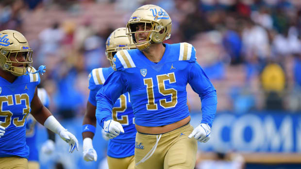 UCLA Bruins defensive lineman Laiatu Latu (15) celebrates after intercepting a pass against the North Carolina Central Eagles during the first half at Rose Bowl. Mandatory Credit: Gary A. Vasquez-USA TODAY Sports