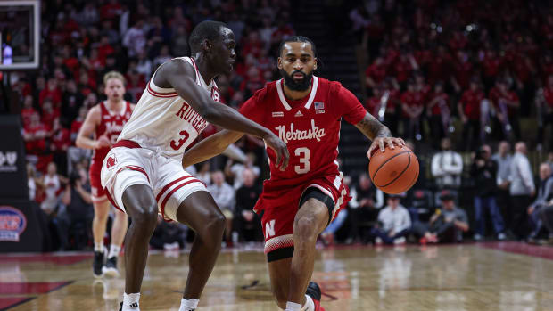 Jan 17, 2024; Piscataway, New Jersey, USA; Nebraska Cornhuskers guard Brice Williams (3) dribbles against Rutgers Scarlet Knights forward Mawot Mag (3) during the first half at Jersey Mike's Arena.