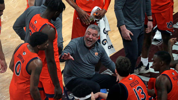 Mar 2, 2022; Starkville, Mississippi, USA; Auburn Tigers head coach Bruce Pearl talks with his team during a timeout during the first half again the Mississippi State Bulldogs at Humphrey Coliseum. Mandatory Credit: Petre Thomas-USA TODAY Sports