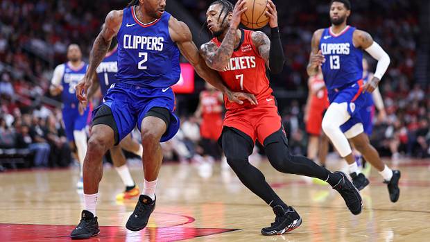 Rockets forward Cam Whitmore (7) drives with the ball as Los Angeles Clippers forward Kawhi Leonard (2) defends during the second quarter at Toyota Center
