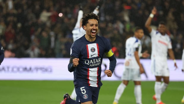 Marquinhos pictured celebrating after scoring for PSG against Strasbourg in December 2022