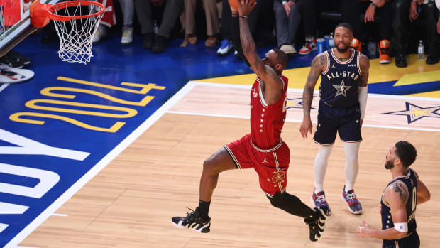 LeBron James dunks during the 2024 NBA All-Star Game.