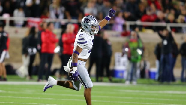 Kansas State Wildcats defensive safety Kobe Savage (2) reacts after intercepting a pass against the Texas Tech Red Raiders in the second half at Jones AT&T Stadium and Cody Campbell Field.
