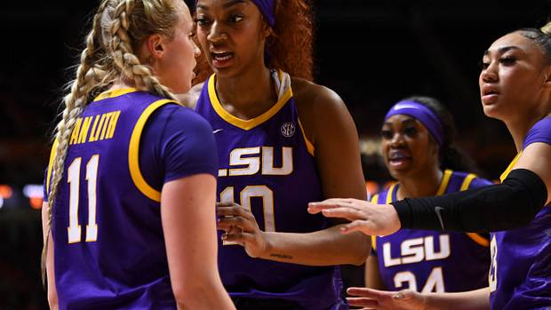 LSU Tigers teammates Angel Reese and Hailey Van Lith talk during a timeout.