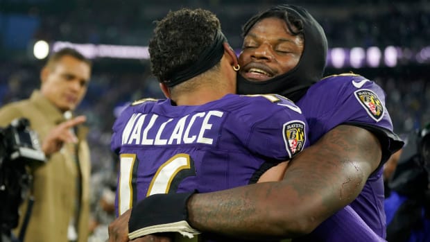 Dec 10, 2023; Baltimore, Maryland, USA; Baltimore Ravens wide receiver Tylan Wallace (16) and quarterback Lamar Jackson (8) celebrate after winning in overtime against the Los Angeles Rams at M&T Bank Stadium. Mandatory Credit: Jessica Rapfogel-USA TODAY Sports