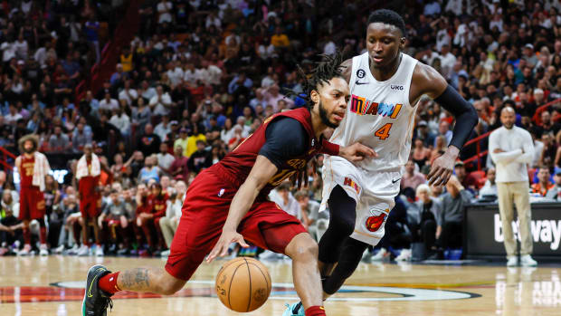 Mar 8, 2023; Miami, Florida, USA; Cleveland Cavaliers guard Darius Garland (10) drives to the basket as Miami Heat guard Victor Oladipo (4) defends during the fourth quarter at Miami-Dade Arena.
