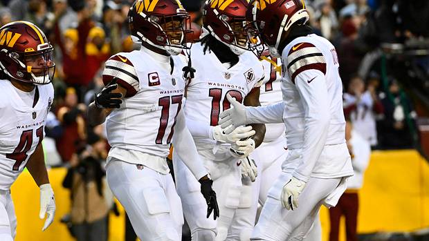 Washington Commanders receivers Terry McLaurin (17), Jahan Dotson (right), and Curtis Samuel (10)