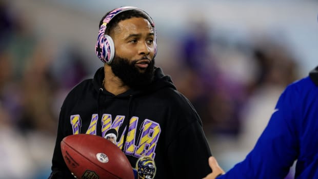 Baltimore Ravens wide receiver Odell Beckham Jr. warms up before a playoff game.