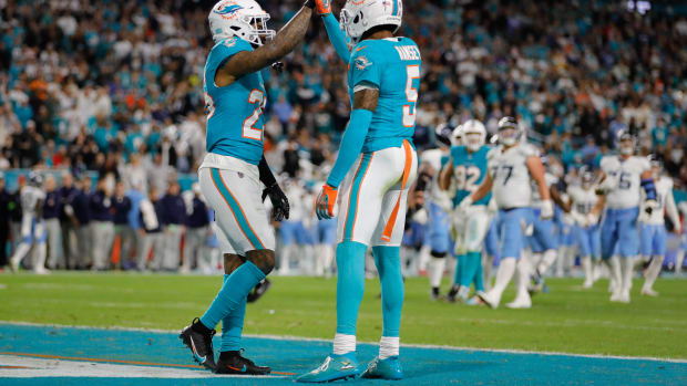 Miami Dolphins cornerback Xavien Howard and cornerback Jalen Ramsey celebrate after a play.