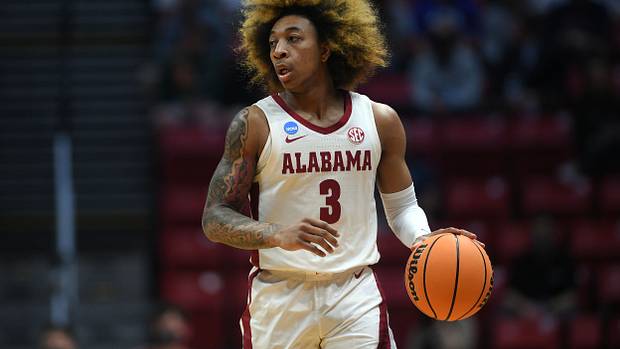 Alabama Crimson Tide guard JD Davison (3) controls the ball against the Notre Dame Fighting Irish in the first half during the first round of the 2022 NCAA Tournament at Viejas Arena.