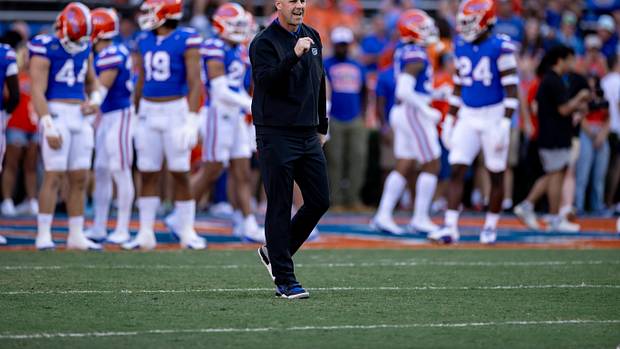 Florida Gators head coach Billy Napier cheers before the game.