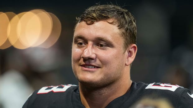 Aug 27, 2022; Atlanta, Georgia, USA; Atlanta Falcons guard Chris Lindstrom (63) on the bench against the Jacksonville Jaguars during the second half at Mercedes-Benz Stadium.