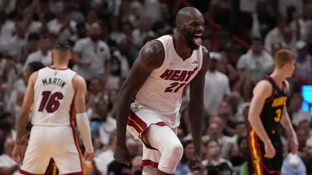 Apr 19, 2022; Miami, Florida, USA; Miami Heat center Dewayne Dedmon (21) reacts after scoring against the Atlanta Hawks during the second half in game two of the first round for the 2022 NBA playoffs at FTX Arena.