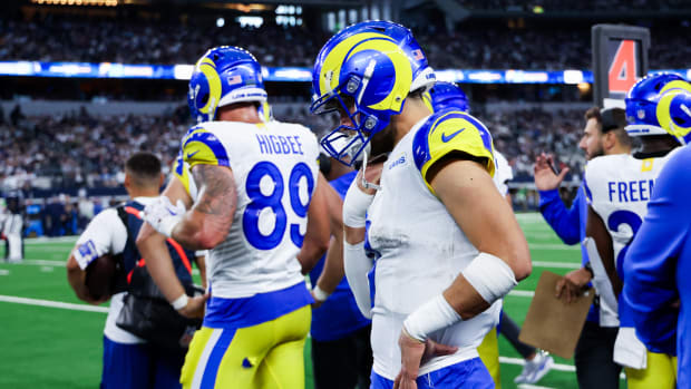 Oct 29, 2023; Arlington, Texas, USA; Los Angeles Rams quarterback Matthew Stafford (9) reacts on the bench during the second half against the Dallas Cowboys at AT&T Stadium. Mandatory Credit: Kevin Jairaj-USA TODAY Sports