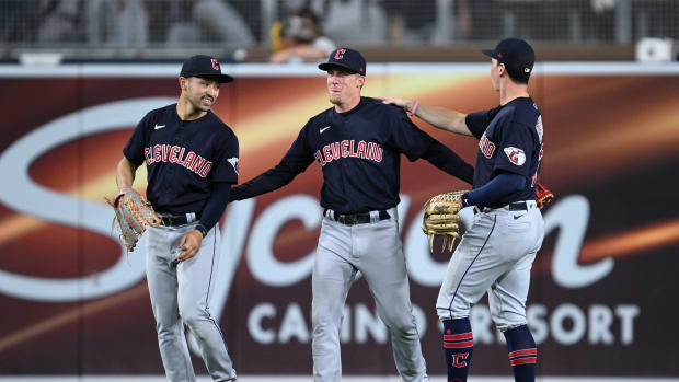 Jun 15, 2023; San Diego, California, USA; Cleveland Guardians center fielder Myles Straw (7) celebrates with left fielder Steven Kwan (38) and right fielder Will Brennan (17) after defeating the San Diego Padres at Petco Park. Mandatory Credit: Orlando Ramirez-USA TODAY Sports