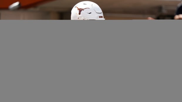 Texas Longhorns quarterback Arch Manning (16) warms up before the game against the Kansas Jayhawks at Darrell K Royal-Texas Memorial Stadium.