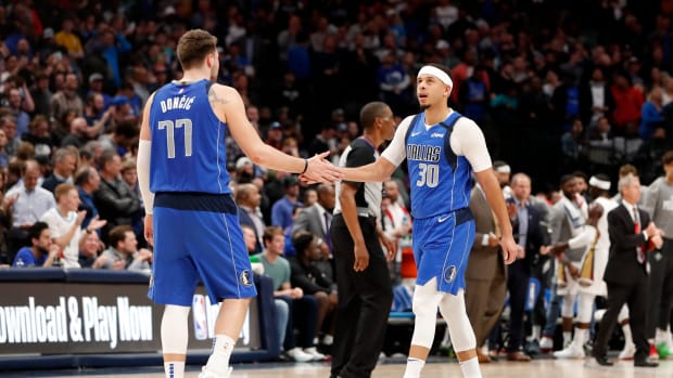 Luka Doncic and Seth Curry during the 2019-20 season.