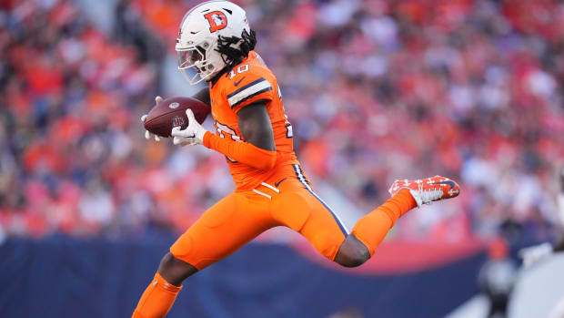 Oct 8, 2023; Denver, Colorado, USA; Denver Broncos wide receiver Jerry Jeudy (10) catches the ball in the second half against the New York Jets at Empower Field at Mile High. Mandatory Credit: Ron Chenoy-USA TODAY Sports