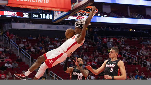 Rockets' Amen Thompson dunks against the Miami Heat in Friday's preseason victory inside the Toyota Center.
