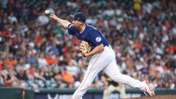 Sep 10, 2023; Houston, Texas, USA; Houston Astros relief pitcher Joel Kuhnel (60) pitches during the eighth inning against the San Diego Padres at Minute Maid Park.