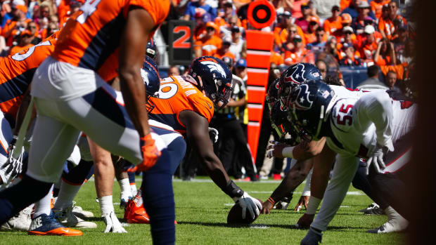Broncos center Lloyd Cushenberry III (79) lines up across from the Houston Texans in the first quarter at Empower Field at Mile High.