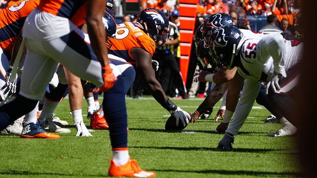 Broncos center Lloyd Cushenberry III (79) lines up across from the Houston Texans in the first quarter at Empower Field at Mile High.
