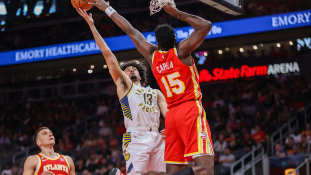 Atlanta Hawks center Clint Capela blocks Indiana Pacers forward Jordan Nwora's shot.