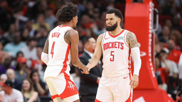 Rockets guard Jalen Green (4) celebrates with guard Fred VanVleet (5) after a play during the second half against the San Antonio Spurs at Toyota Center.
