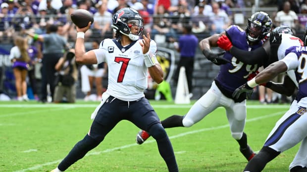 Sep 10, 2023; Baltimore, Maryland, USA; Houston Texans quarterback C.J. Stroud (7) attempts a pass as Baltimore Ravens linebacker Odafe Oweh (99) rushes during the second half at M&T Bank Stadium.