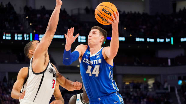 Mar 17, 2022; Fort Worth, TX, USA; Creighton Bluejays forward Ryan Hawkins (44) shoots over San Diego State Aztecs guard Matt Bradley (3) during the second half in the first round of the 2022 NCAA Tournament at Dickies Arena. Mandatory Credit: Chris Jones-USA TODAY Sports