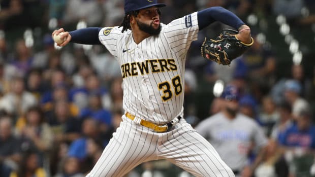 Sep 30, 2023; Milwaukee, Wisconsin, USA; Milwaukee Brewers relief pitcher Devin Williams (38) delivers a pitch against the Chicago Cubs in the eighth inning at American Family Field. Mandatory Credit: Michael McLoone-USA TODAY Sports