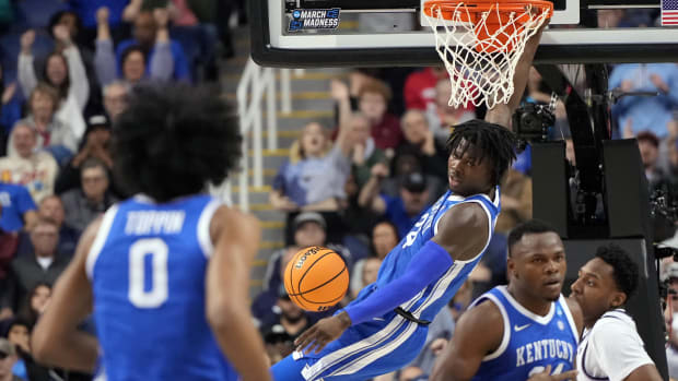 Mar 19, 2023; Greensboro, NC, USA; Kentucky Wildcats forward Chris Livingston (24) reacts to a basket during the first half against the Kansas State Wildcats in the second round of the 2023 NCAA men s basketball tournament at Greensboro Coliseum.
