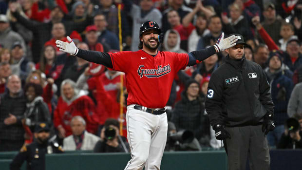 Oct 15, 2022; Cleveland, Ohio, USA; Cleveland Guardians catcher Austin Hedges (17) reacts after hitting a single against the New York Yankees in the second inning during game three of the NLDS for the 2022 MLB Playoffs at Progressive Field. Mandatory Credit: Ken Blaze-USA TODAY Sports