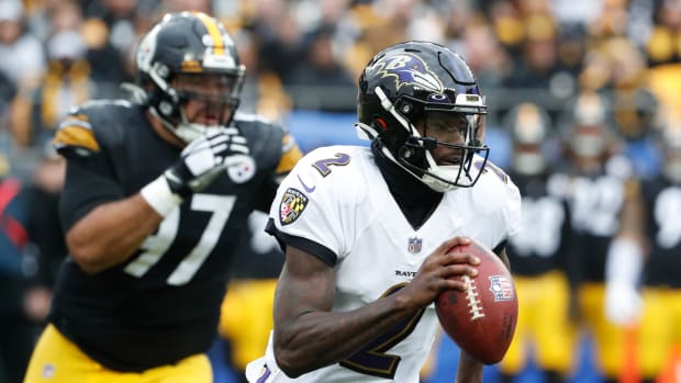 Baltimore Ravens quarterback Tyler Huntley (2) scrambles with the ball against the Pittsburgh Steelers during the first quarter at Acrisure Stadium. Mandatory Credit: Charles LeClaire-USA TODAY Sports