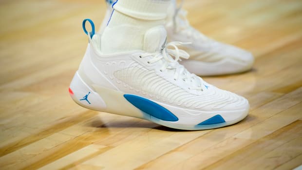View of white and blue Jordan Luka 1 shoes.