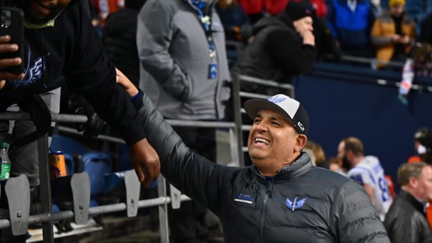 Feb 23, 2023; Seattle, WA, USA; St. Louis Battlehawks head coach Anthony Becht celebrates with fans after the game between the Seattle Sea Dragons and the St. Louis Battlehawks at Lumen Field. St. Louis defeated Seattle 20-18. Mandatory Credit: Steven Bisig-USA TODAY Sports  