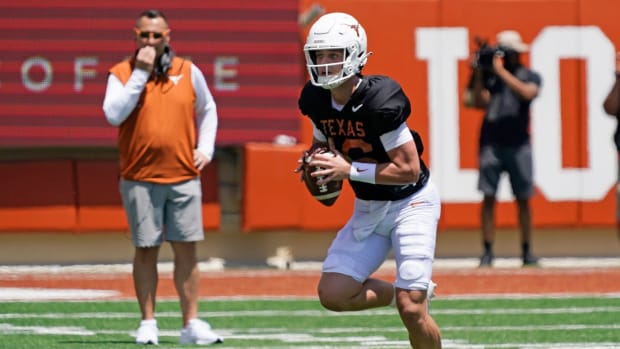 Texas Longhorns quarterback Arch Manning looks to throw a pass.