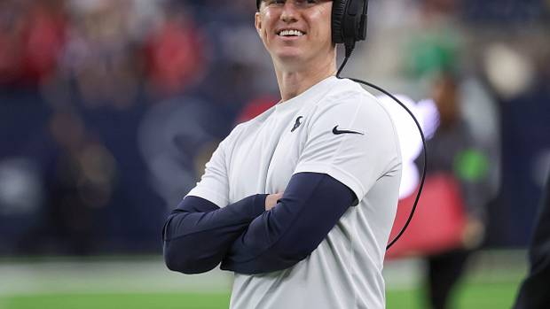 Texans offensive coordinator Bobby Slowik smiles before the game against the Cleveland Browns at NRG Stadium.