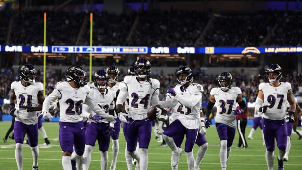 Baltimore Ravens linebacker Jadeveon Clowney (24) celebrates with his teammates after recovering a fumble against the Los Angeles Chargers during the fourth quarter at SoFi Stadium. Mandatory Credit: Kiyoshi Mio-USA TODAY Sports