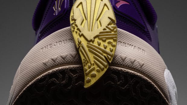 The heel of Kyrie Irving's purple and red ANTA shoe.