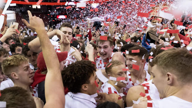 Wisconsin celebrates securing a share of the Big Ten regular season title.