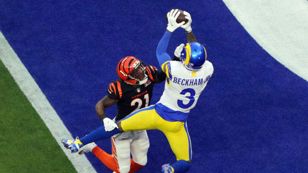 Feb 13, 2022; Inglewood, California, USA; Los Angeles Rams wide receiver Odell Beckham Jr. (3) makes a catch for a touchdown against Cincinnati Bengals wide receiver Ja'Marr Chase (1) in the first quarter in Super Bowl LVI at SoFi Stadium. Mandatory Credit: Kirby Lee-USA TODAY Sports