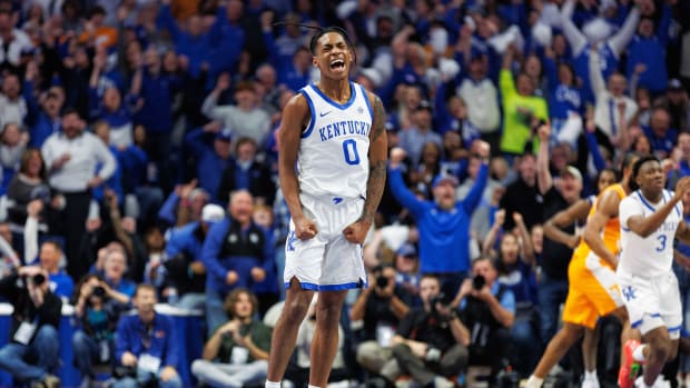 Kentucky Wildcats guard Rob Dillingham celebrates during a game against the Tennessee Volunteers.