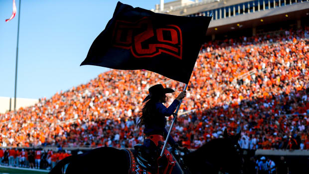 Sep 2, 2023; Stillwater, Oklahoma, USA; The Oklahoma State Cowboys flag is flown after a touchdown against Central Arkansas in the first quarter at Boone Pickens Stadium. Mandatory Credit: Nathan J. Fish-USA TODAY Sports