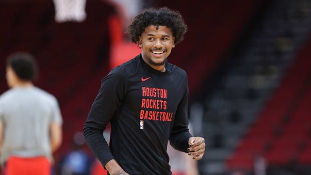 Rockets guard Jalen Green (4) smiles on the court before the game against the Washington Wizards at Toyota Center.