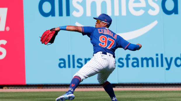 Feb 26, 2023; Port St. Lucie, Florida, USA; New York Mets right fielder Lorenzo Cedrola (97) throws the ball into the infield during the fifth inning against the Washington Nationals at Clover Park. Mandatory Credit: Reinhold Matay-USA TODAY Sports