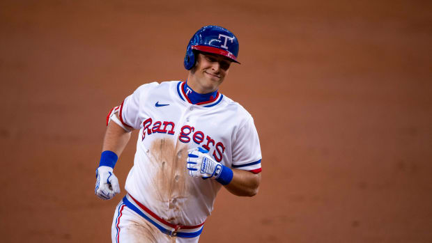 Jun 25, 2022; Arlington, Texas, USA; Texas Rangers first baseman Nathaniel Lowe (30) rounds the bases after he hits a two run home run against the Washington Nationals during the second inning at Globe Life Field. Mandatory Credit: Jerome Miron-USA TODAY Sports