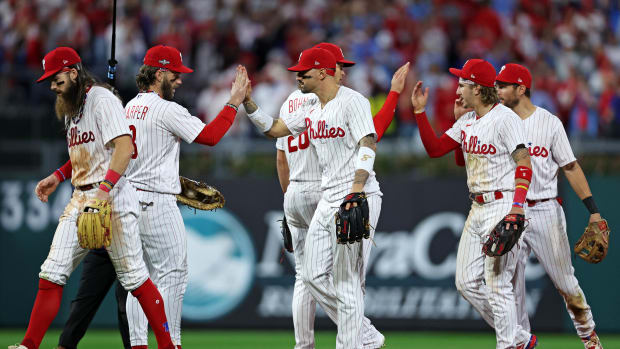 Oct 11, 2023; Philadelphia, Pennsylvania, USA; The Philadelphia Phillies celebrate after beating the Atlanta Braves in game three of the NLDS for the 2023 MLB playoffs at Citizens Bank Park. Mandatory Credit: Bill Streicher-USA TODAY Sports  