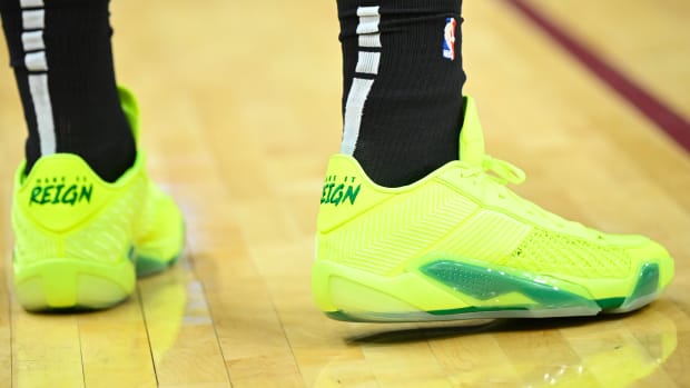 Orlando Magic forward Paolo Banchero's green Air Jordan sneakers.